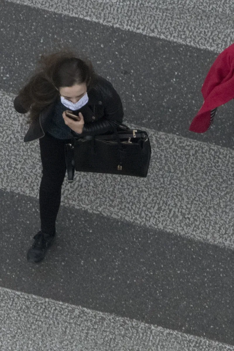 Vertical monochrome field in dark gray tones, with restrained contrast, mixed edges, and a focused field